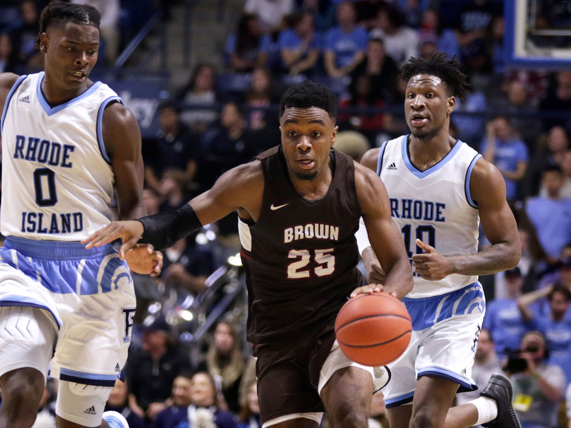 Brown forward Tamenang Choh dribbles